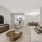 Living room flows into bright dining room