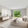 Bedroom with natural lighting and high ceilings